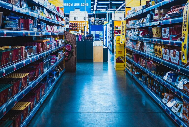 yellow and green labeled box on shelves